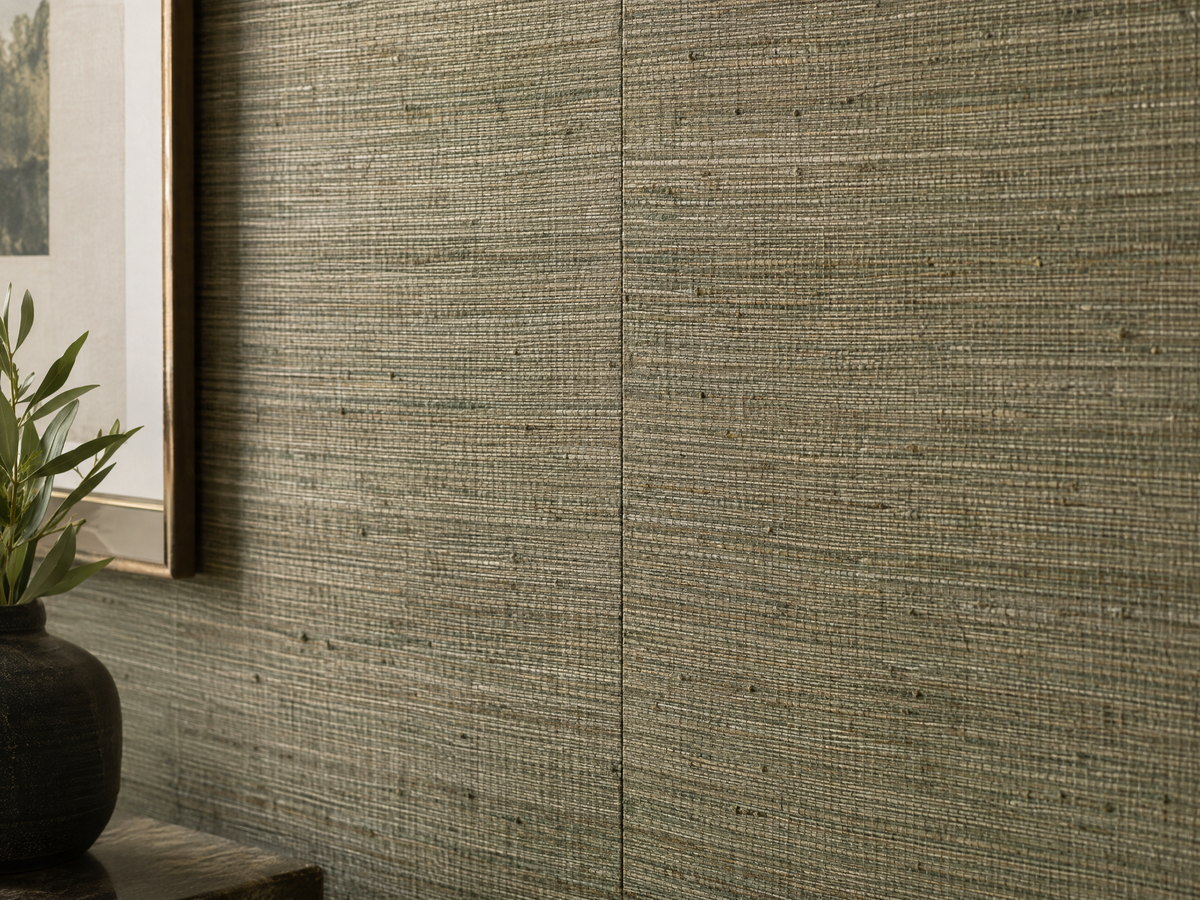 Close-up of a warm textured wallcovering with a straight, carefully aligned seam